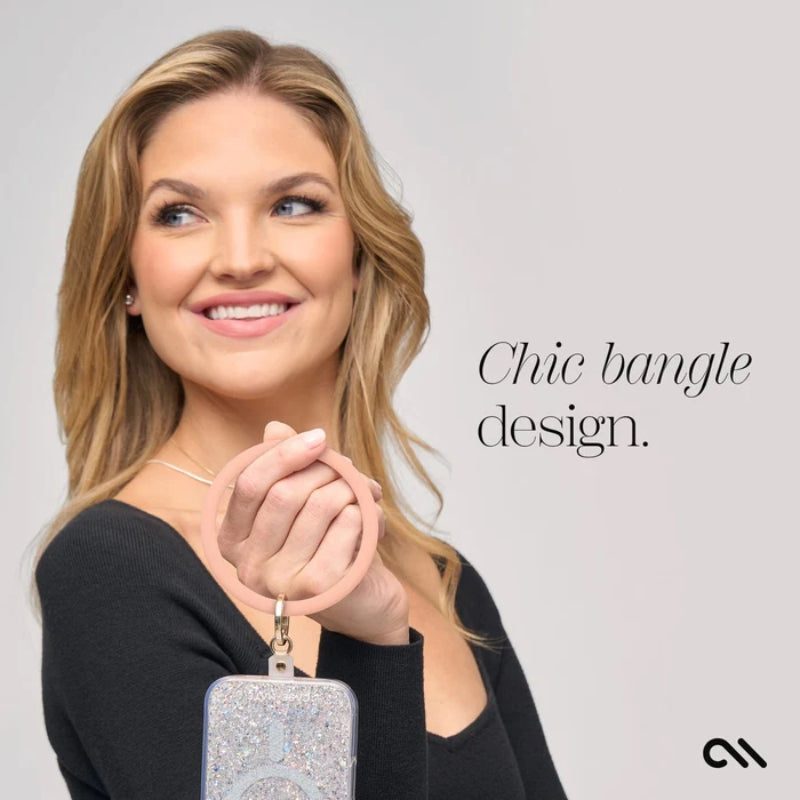 Case-Mate telefono apyrankė - riešo dirželis išmaniajam telefonui (persikų spalva)