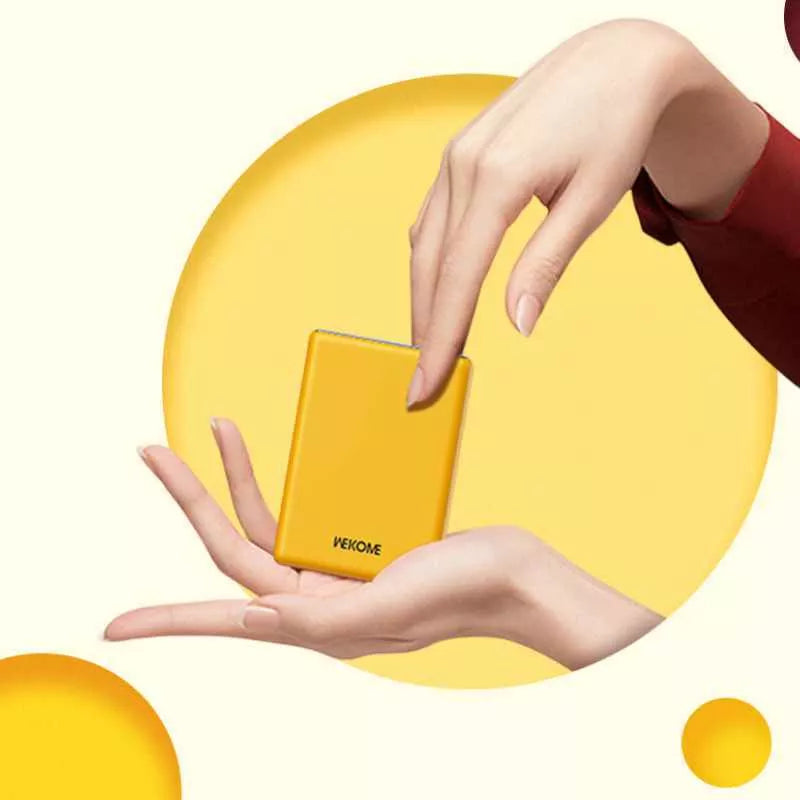 WEKOME WP-27 Tint serija – Nešiojama baterija 10000 mAh itin greitas įkrovimas USB-C PD 20W + 2x USB-A QC3.0 22.5W (geltona)