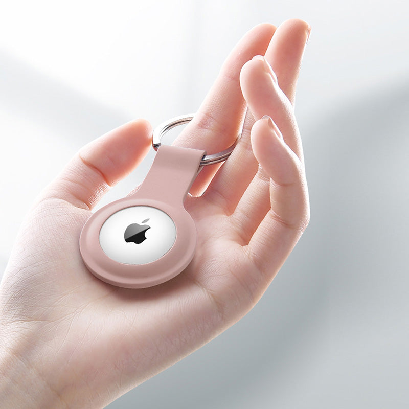 Crong silikoninis dėklas su raktų pakabuku – apsauginis dėklas Apple AirTag raktų pakabukui (smėlio rožinės spalvos)